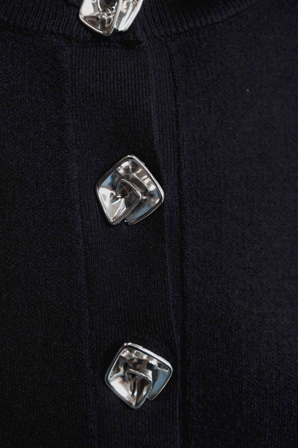 CHAQUETA PUNTO BOTONES